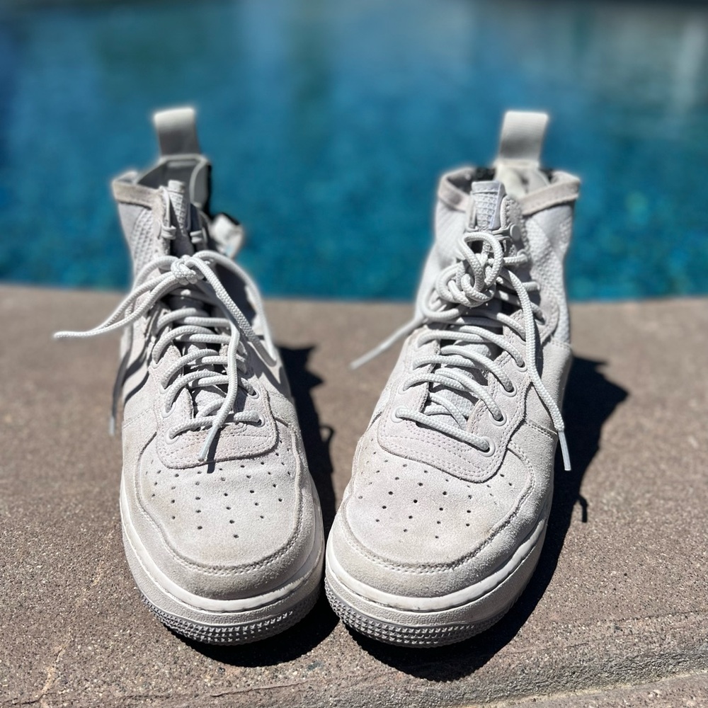 Light grey Nike air forces.